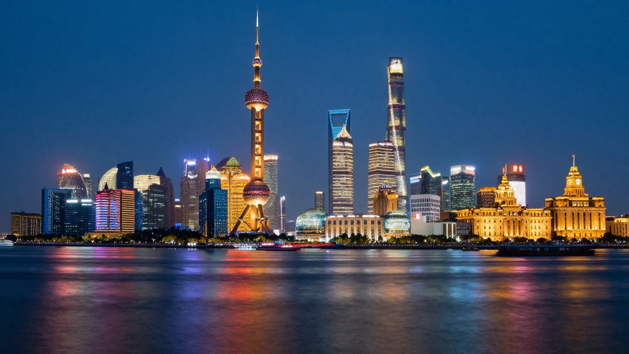 Shanghai skyline at blue hour, towers lit against deep sky and mirrored in the river.