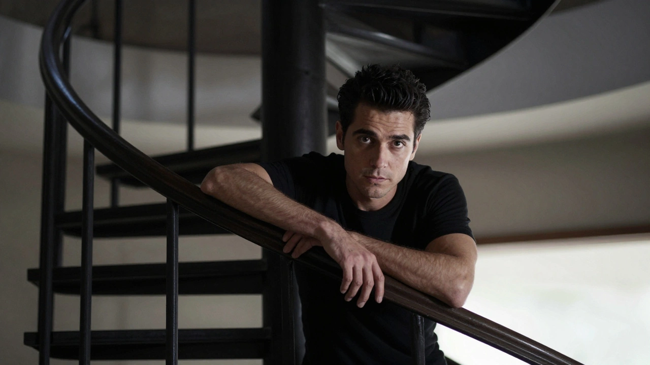A man leaning on a spiral staircase, with curved railings leading to his eyes.