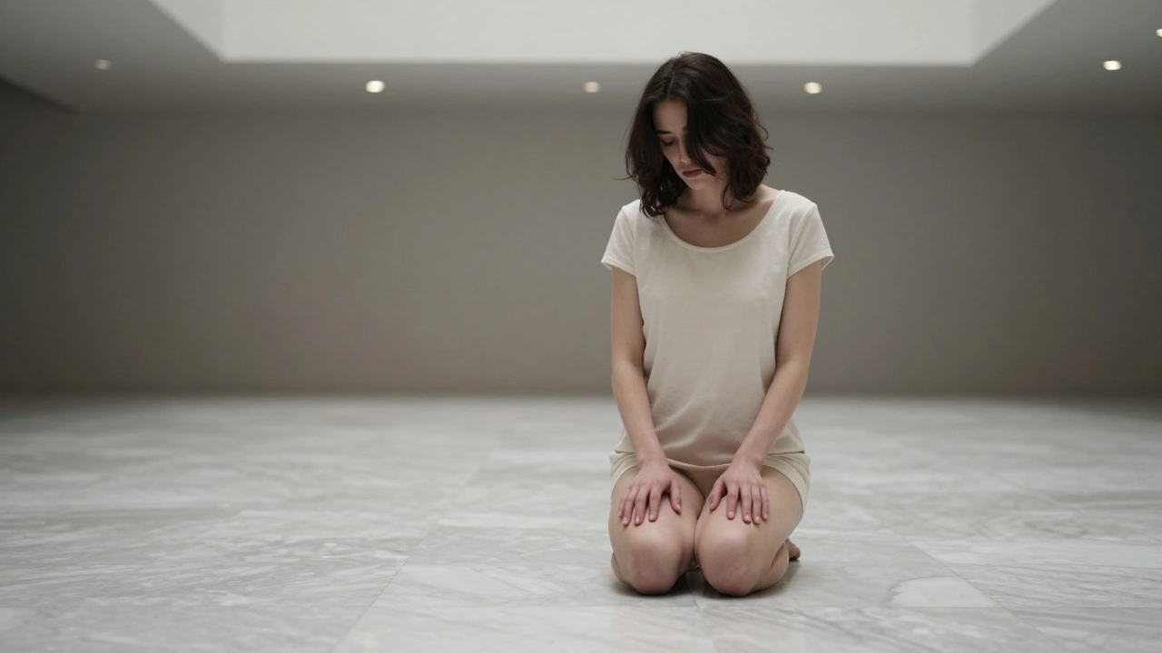A model kneels on marble, shot from ground level, surrounded by empty space and soft ceiling light.