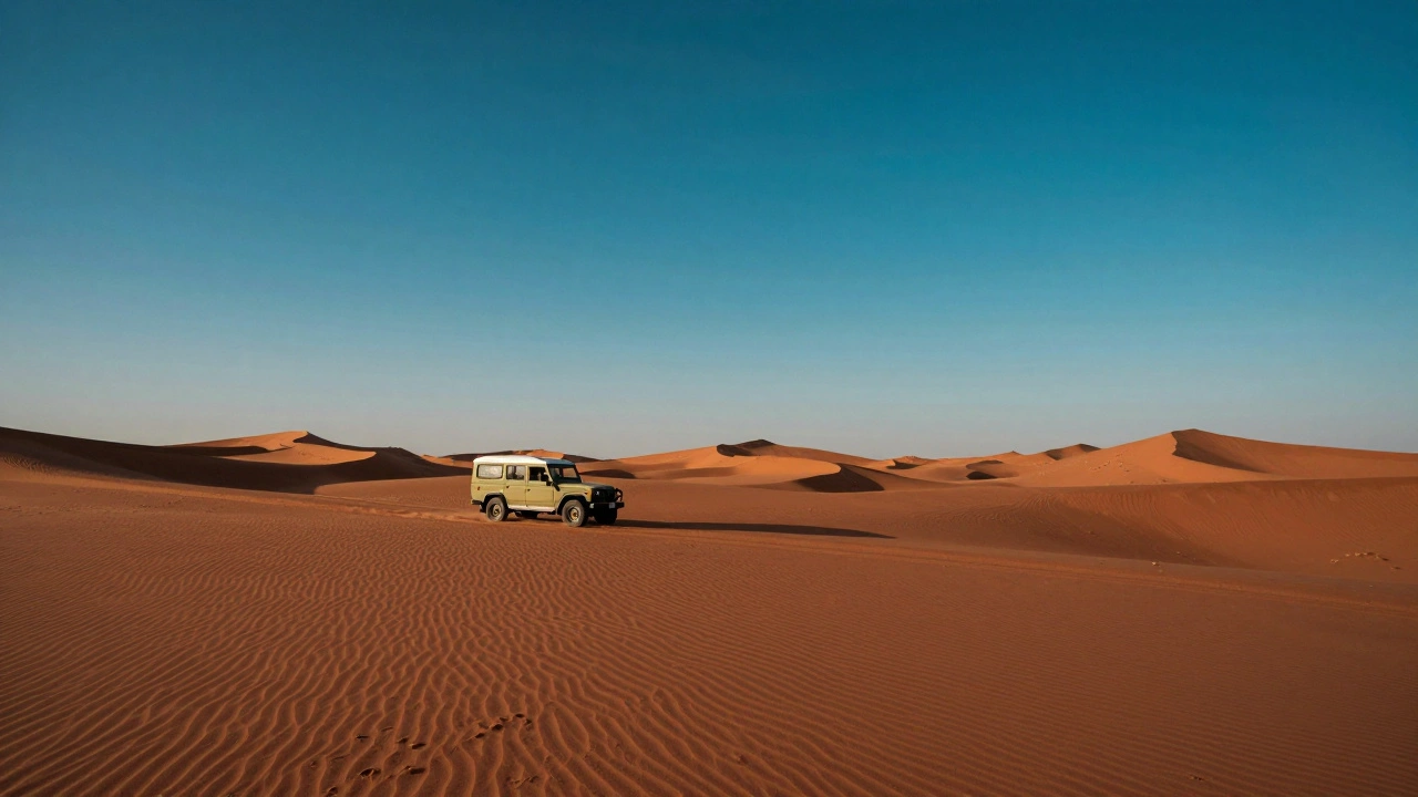 Vintage vehicle off-center on red sand dunes