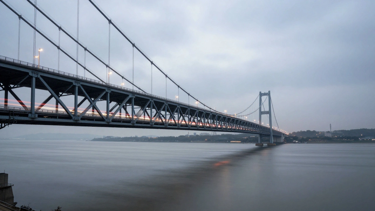 Long exposure of bridge with light trails and smooth water