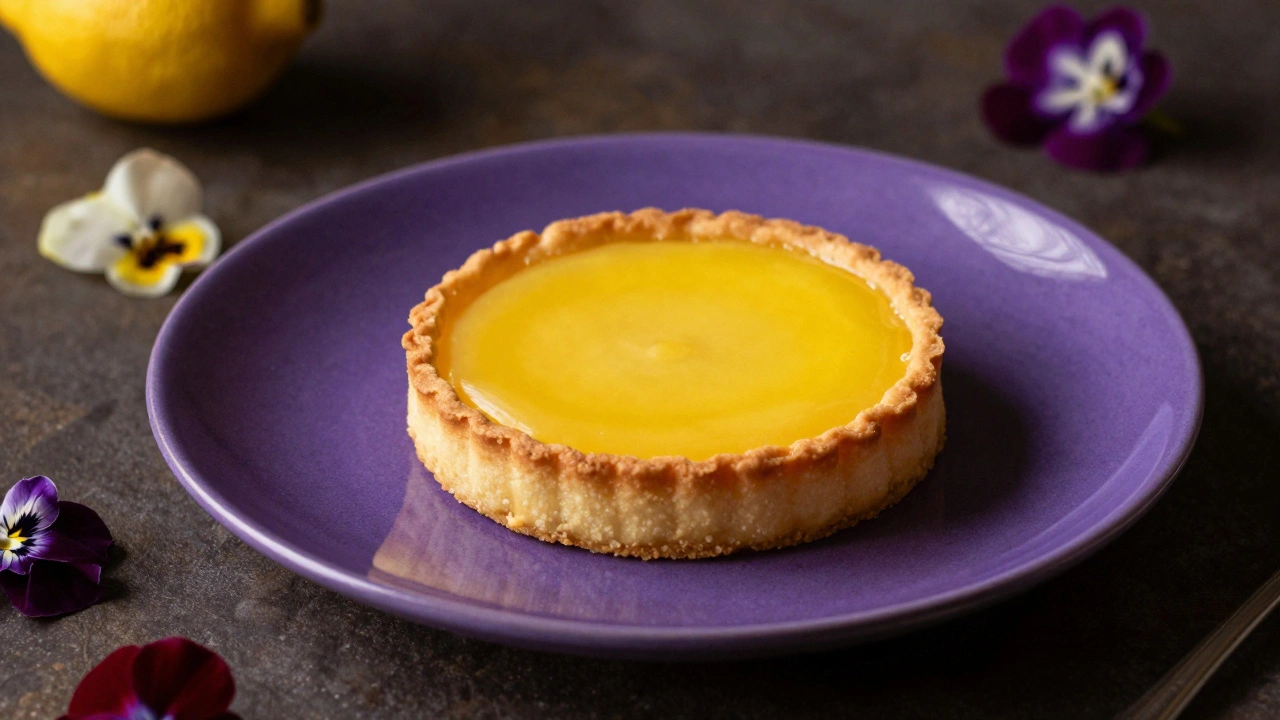 Yellow lemon tart on a purple plate