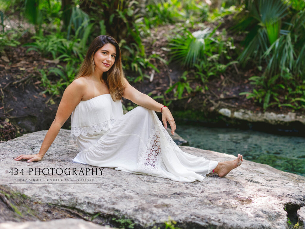 beautiful woman on a rock at rock springs