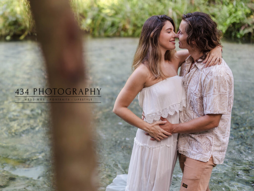 a couples session at rock springs showcasing the natural beauty of the springs. 