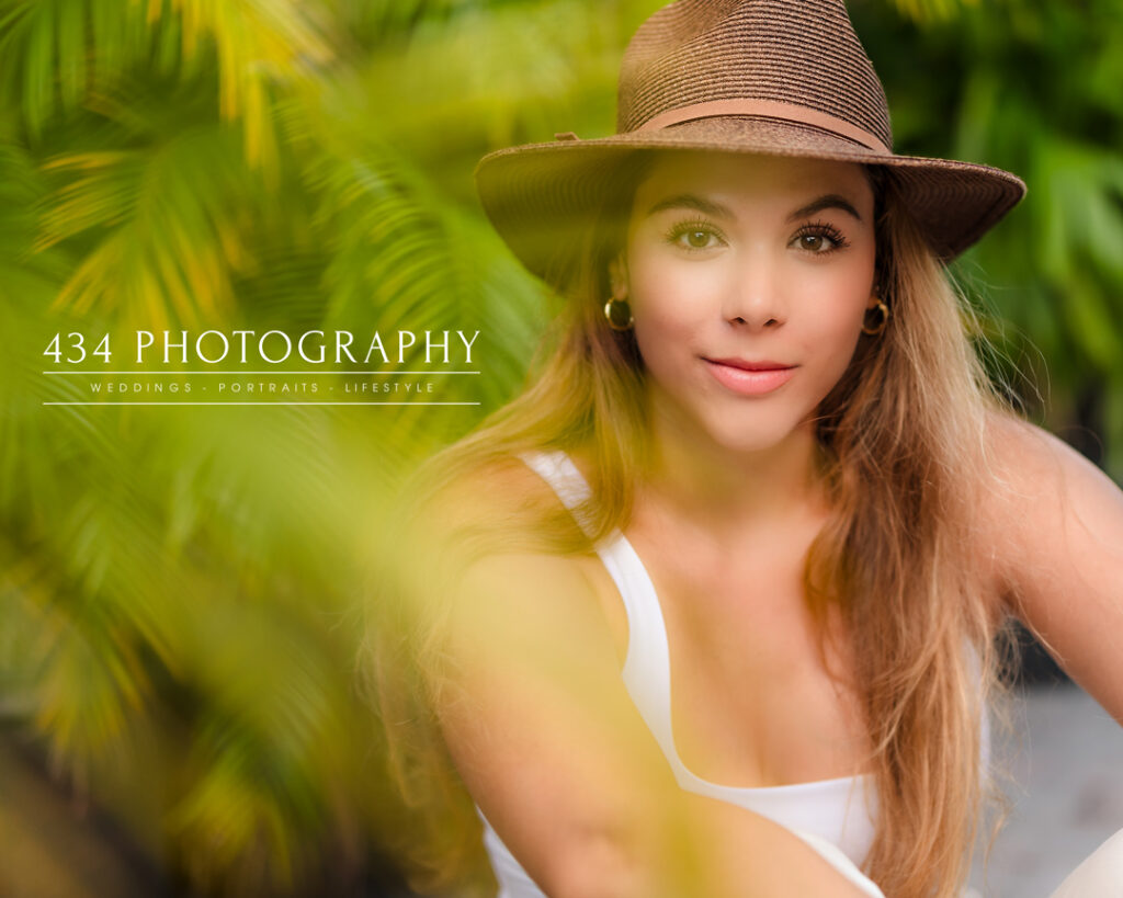 Accessories like a hat make an outfit pop in your senior session
